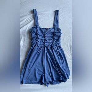 Fashionnova purple romper with pockets